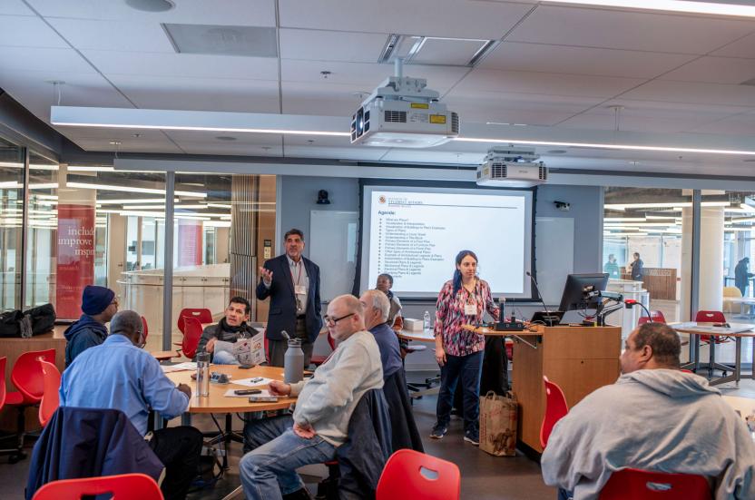 Vince Ippolito and Violet Battat presenting in a classroom