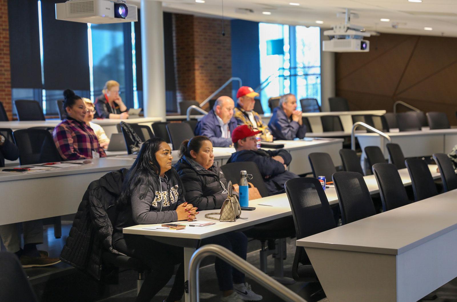 Attendees listening to Assetworks presentation