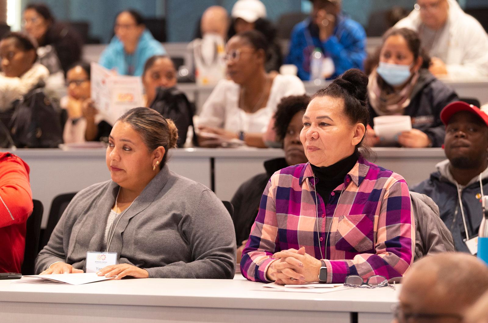 Close up of two attendees at the DRF Town Hall