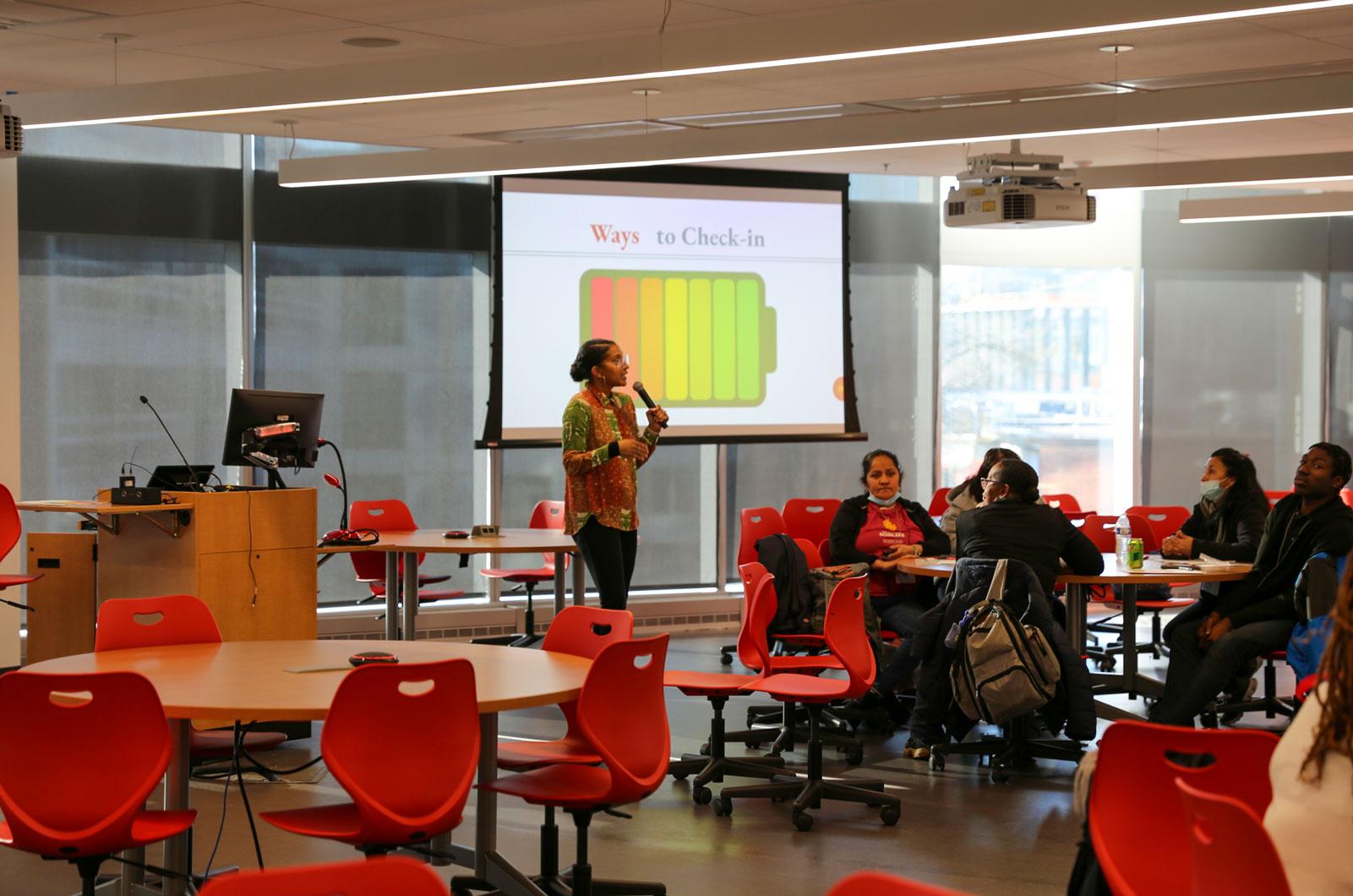 Tania DeBarros presenting on team wellness