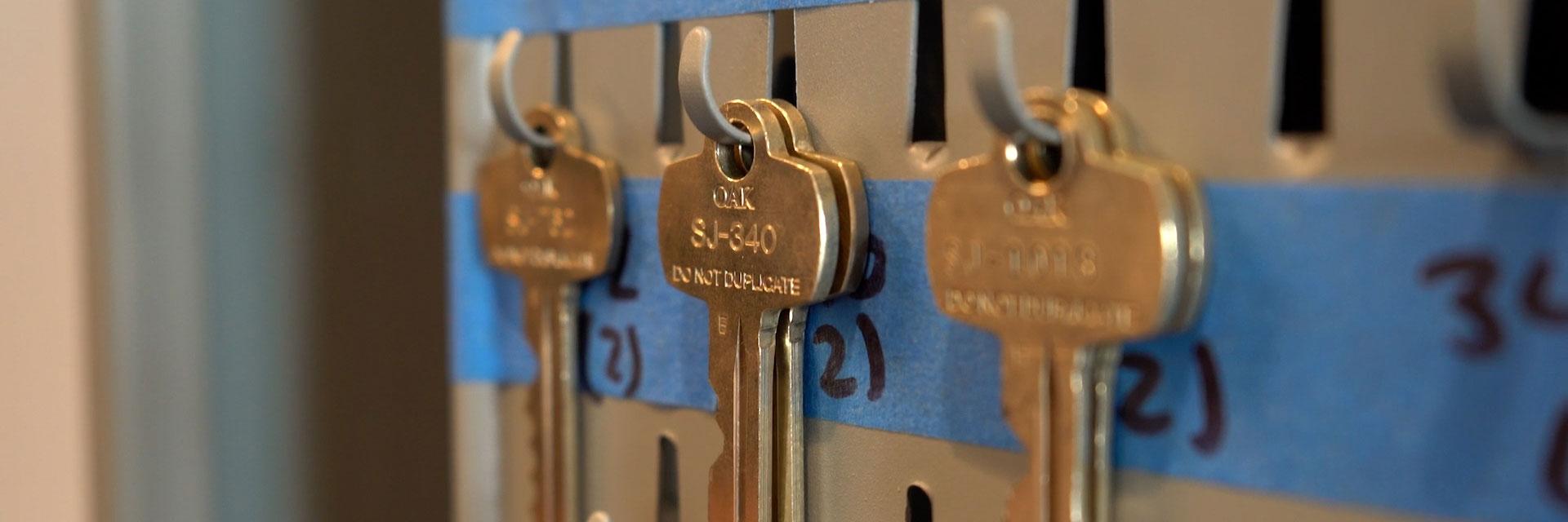 keys on wall hooks 