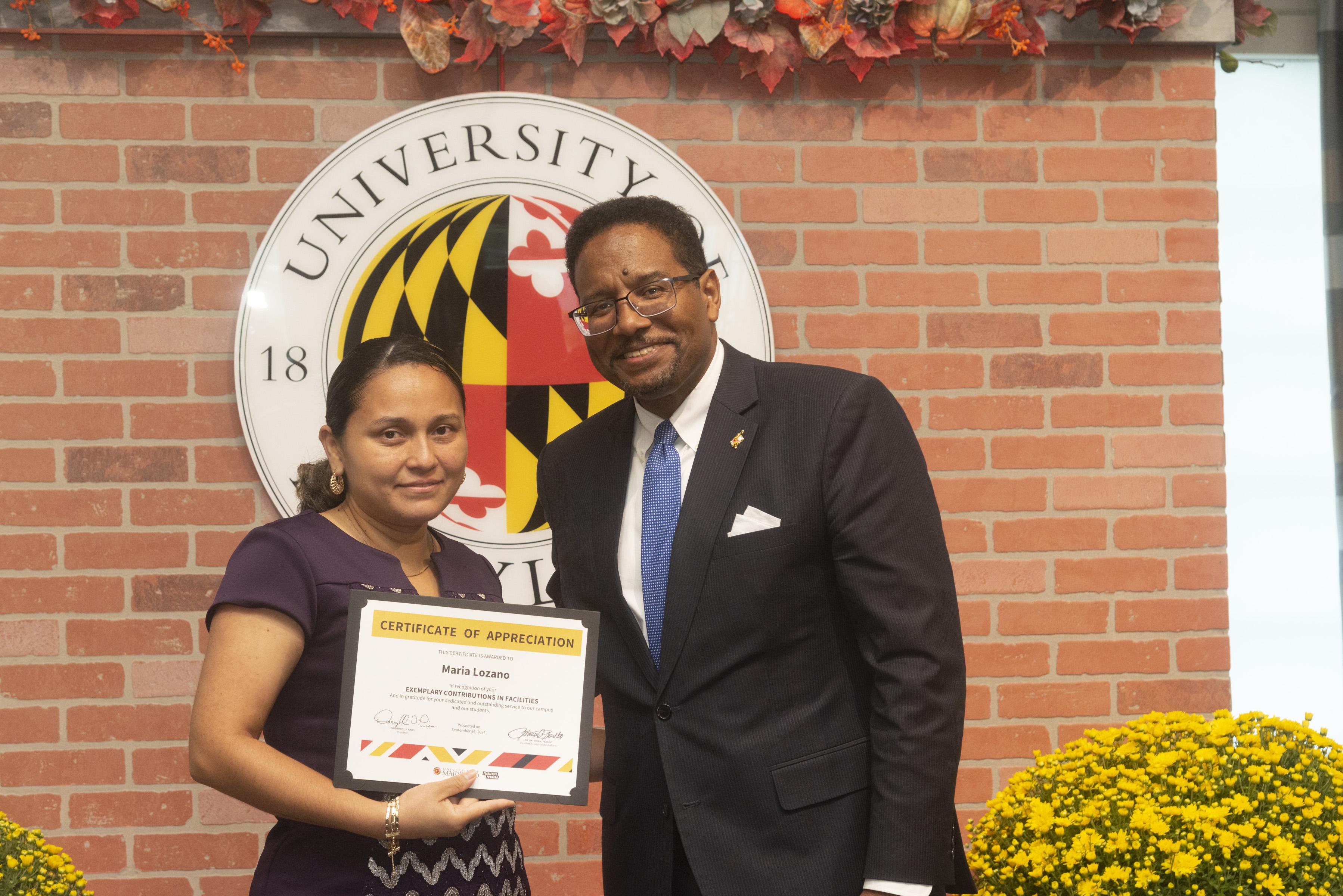 Residential Facilities Housekeeper recognized by President Pines